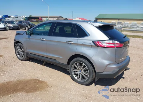 2022 Ford Edge Titanium z USA, uszkodzony, nr VIN 2FMPK4K91NBA97190